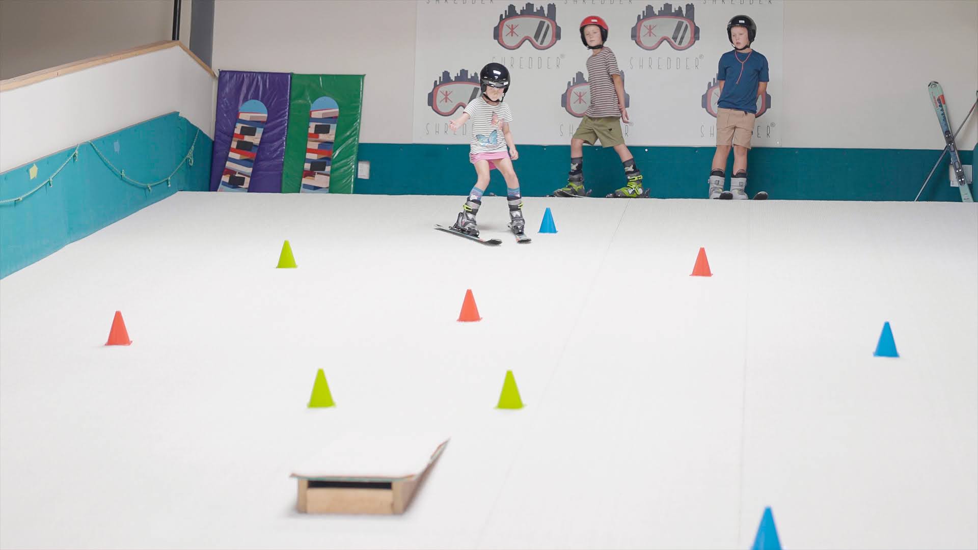 Boy skiing through cones at Shredder Ski and Board School