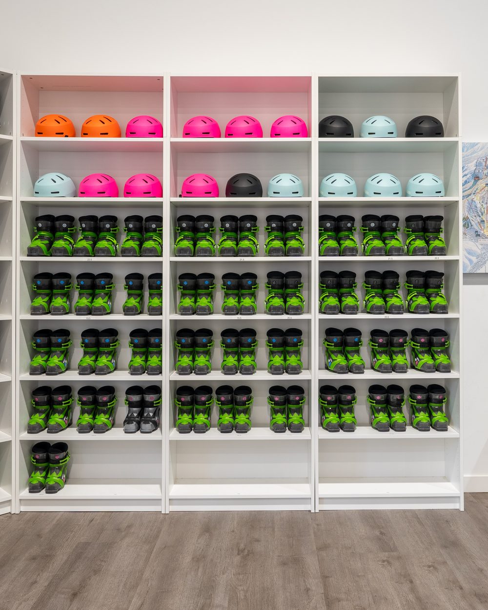 Boots and helmets sorted by size on the shop shelves at Shredder North Side