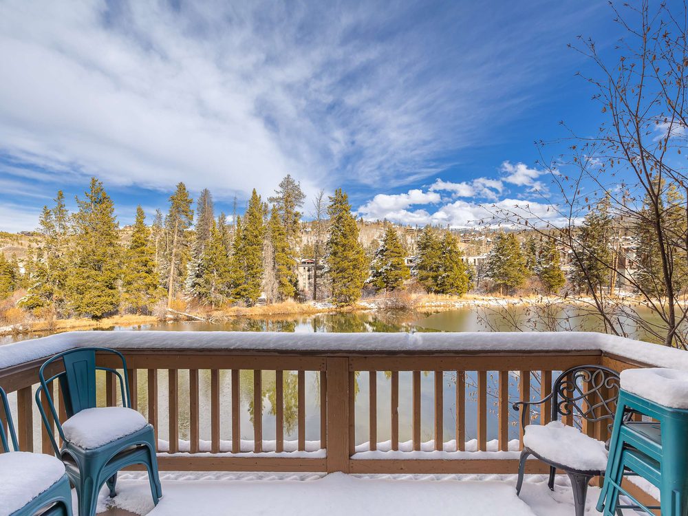 The Shred Haus deck looking over the pond to the mountains