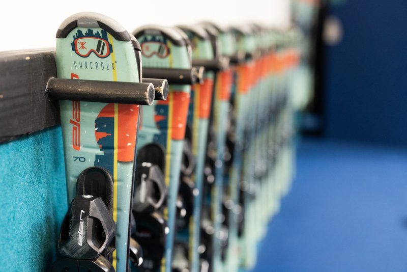 Shredder skis racked and ready at Shredder Wheat Ridge